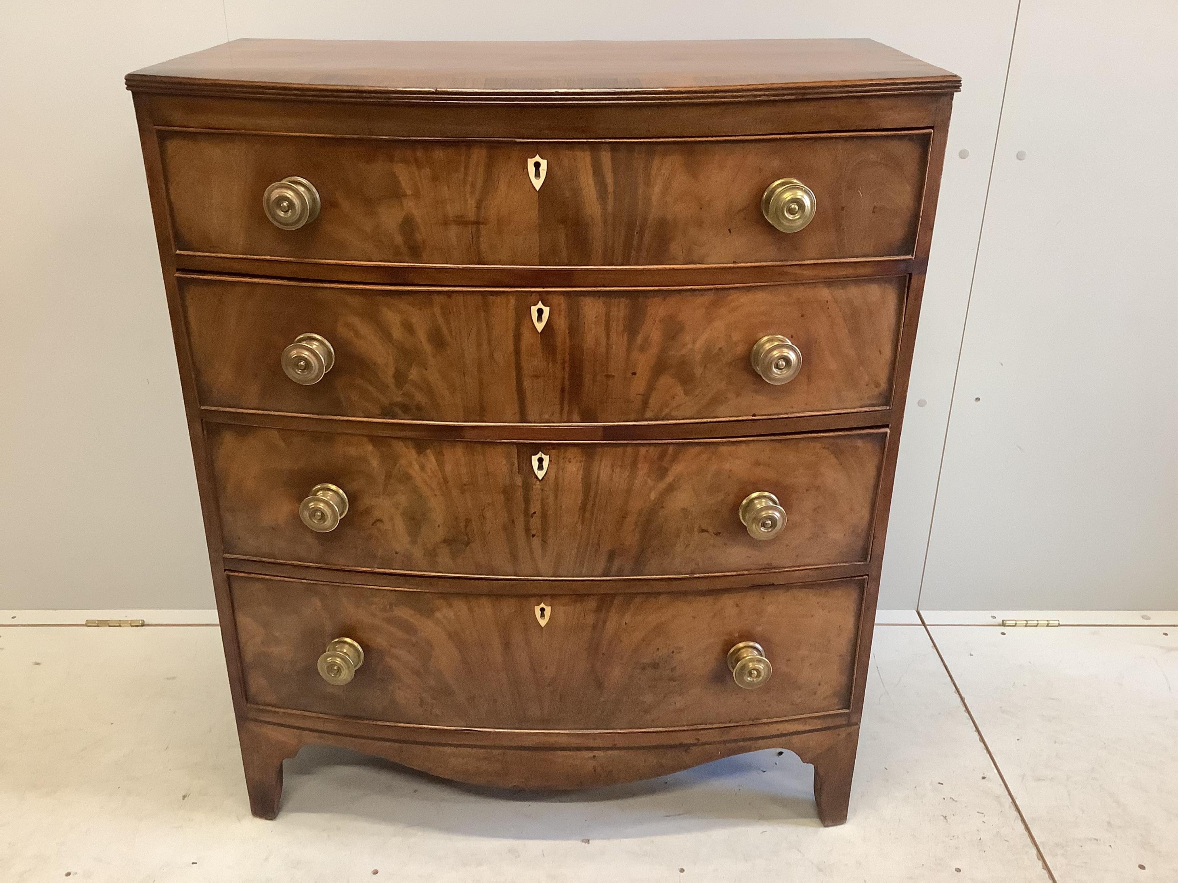 A Regency rosewood banded mahogany bowfront chest of drawers, width 90cm, depth 48cm, height 107cm. Condition - good